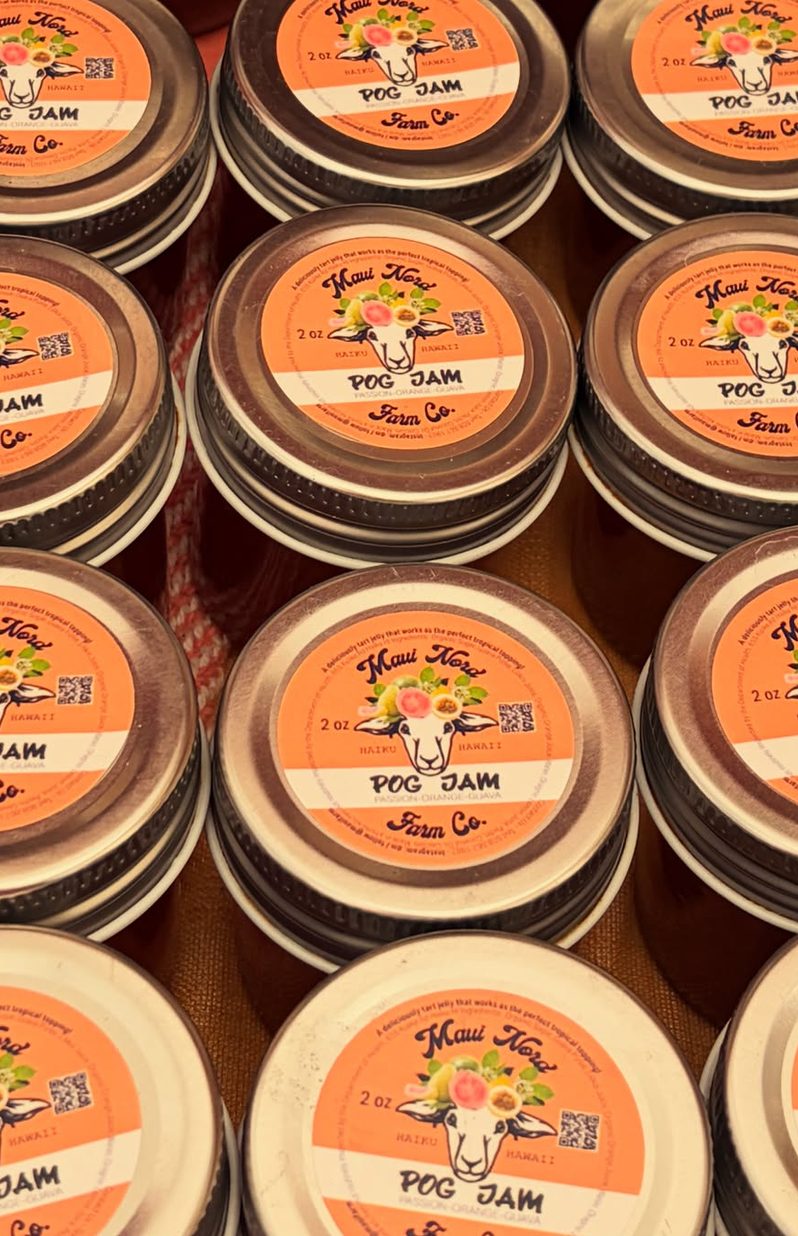 Rows of POG jam jars seen from above.